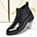 Bottes Chelsea en cuir noir pour homme – vue de profil élégante.