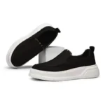 Vue latérale chaussure homme noire sans lacets moderne