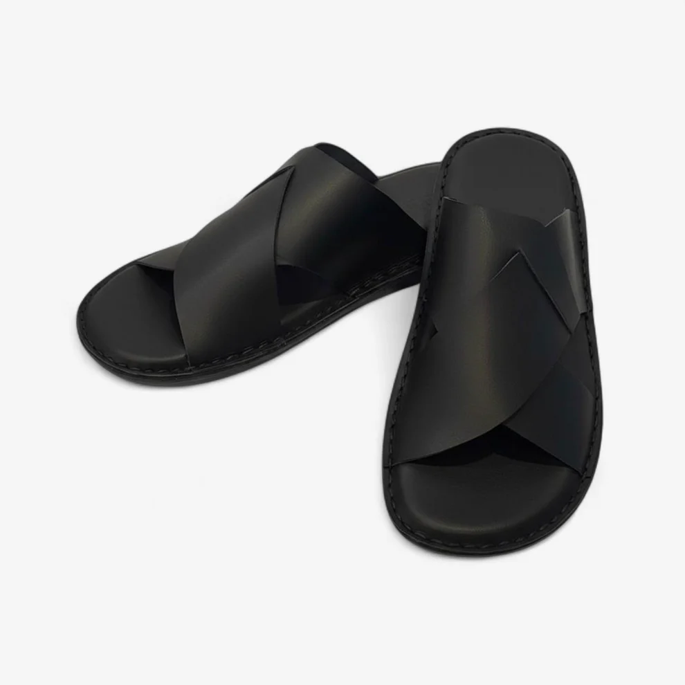 sandales homme cuir noir design croisé confortable