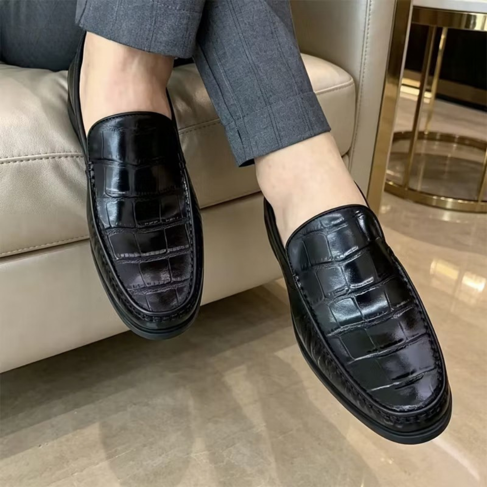 Mocassins noirs pour homme avec motif effet croco et coutures apparentes